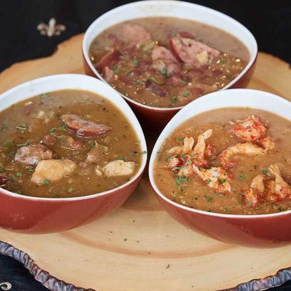 Three bowls of Nola Voodoo Tavern's Creole gumbo, with chicken, sausage, and shrimp.